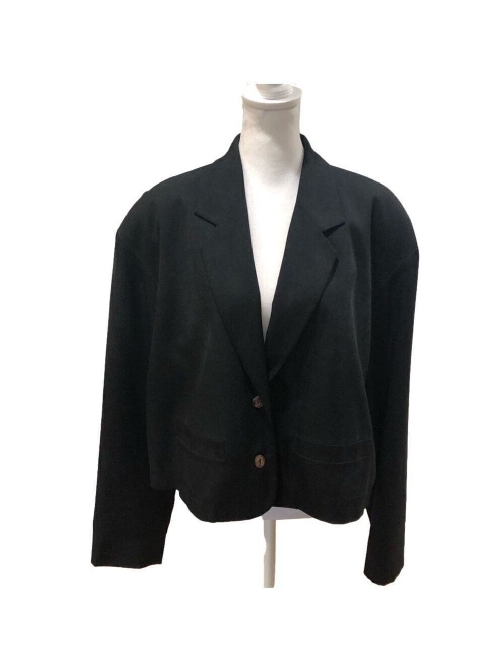 August Silk size 8 black silk cropped ladie’s jacket. Pleated swing back.